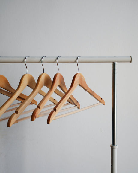 Wooden hanger on a rack