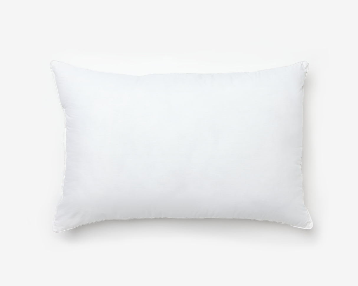 Premium pillow, essential for hotel, Airbnb, and camp accommodations, epitomizing comfort and luxury. Ideal for locational rentals, this hospitality product from Canada, specifically Quebec, offers wholesale options for superior guest experiences.